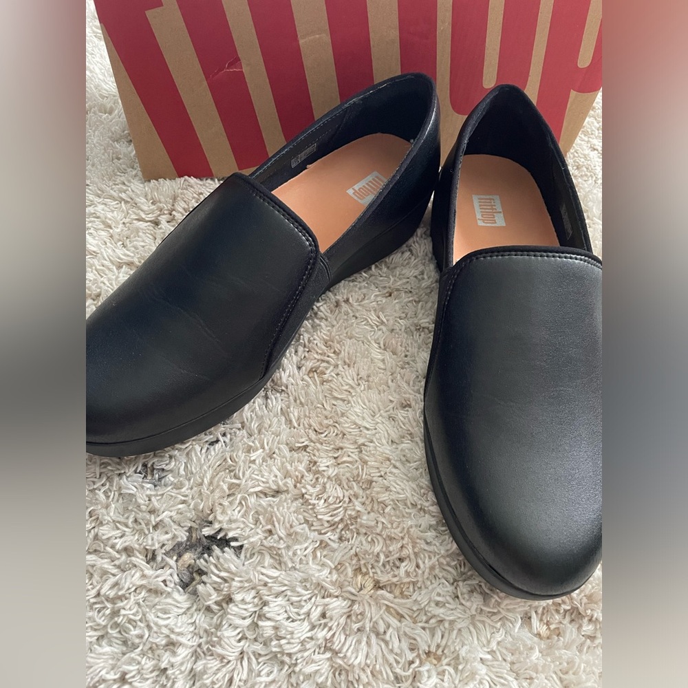 FitFlop black loafers. New with tags. Never worn. Women’s size 8.